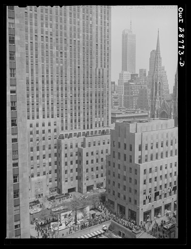 Untitled photo, possibly related to: New York, New York. Exhibit at the outdoor exhibition entitled "The Nature of the Enemy," held on the plaza of Rockefeller Center. View from the top of Rockefeller Center