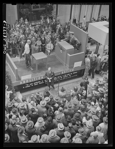 Untitled photo, possibly related to: New York, New York. Exhibit at the outdoor exhibition entitled "The Nature of the Enemy," held on the plaza Rockefeller Center. View from the top of Rockefeller Center"