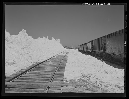 Untitled photo, possibly related to: Freeport Sulphur Company, Hoskins Mound, Texas. Railroad cars at sulphur vat