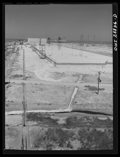 Freeport Sulphur Company, Hoskins Mound, Texas. Sulphur vats and pipelines which carry melted sulphur from the wells