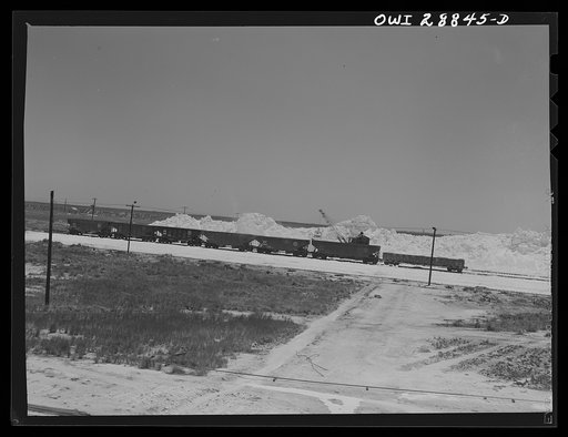 Freeport Sulphur Company, Hoskins Mound, Texas. Sulphur vat from which trains are being loaded