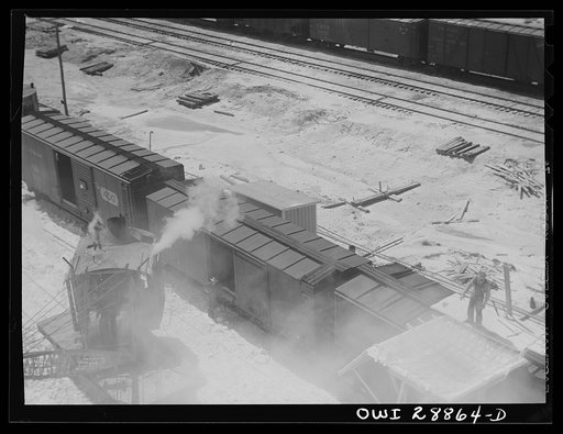 Untitled photo, possibly related to: Freeport Sulphur Company, Hoskins Mound, Texas. Hopper with which boxcars are loaded with sulphur