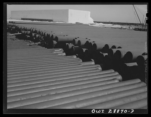 Freeport Sulphur Company. Hoskins Mound, Texas. Pipe storage. Pipelines are laid for carrying superheated water to the wells and for carrying melted sulphur to relay stations and to the vats