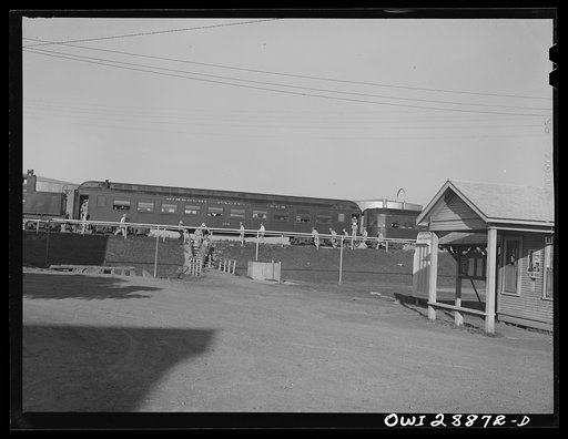 Untitled photo, possibly related to: Freeport Sulphur Company, Hoskins Mound, Texas. Sulphur workers arriving at the plant