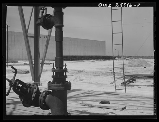 Untitled photo, possibly related to: Freeport Sulphur Company, Hoskins Mound, Texas. Sulphur well with a vat in the background
