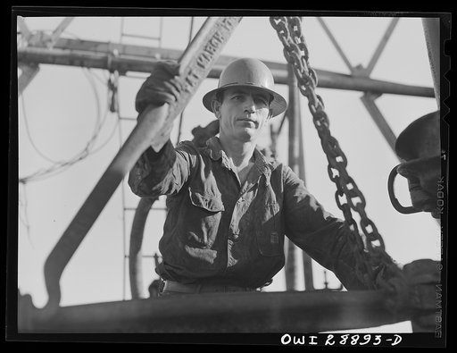 Freeport Sulphur Company, Hoskins Mound, Texas. A sulphur well worker