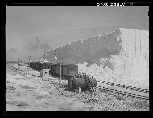 Freeport Sulphur Company, Hoskins Mound, Texas. Sulphur vat from which boxcars are being loaded