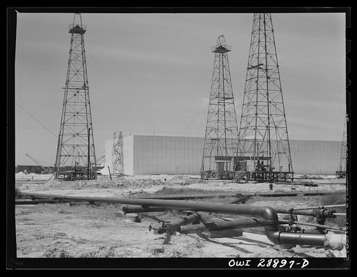 Freeport Sulphur Company, Hoskins Mound, Texas. Sulphur wells and a vat