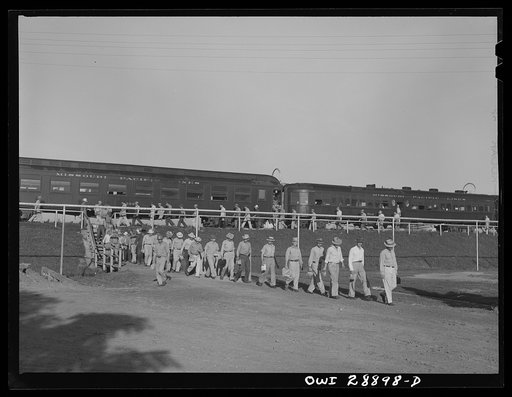 Untitled photo, possibly related to: Freeport Sulphur Company, Hoskins Mound, Texas. Sulphur workers arriving at the plant
