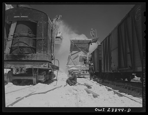 Freeport Sulphur Company, Hoskins Mound, Texas. Loading boxcars with sulphur