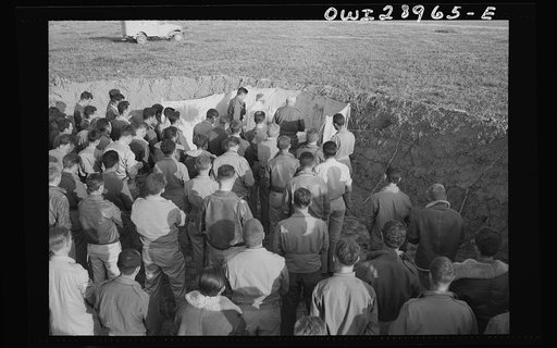 Archbishop Francis J. Spellman of New York, on his recent tour of North African battlefronts, said mass for the men at the Fifty-seventh Fighter Group of the United States Army Ninth Air Force. This Air Force group is located "somewhere in Tunisia" and they are the boys who scored the biggest victor