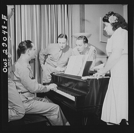 Arlington, Virginia. A group around a piano in the lounge of Idaho Hall, Arlington Farms, a residence for women who work in the United States government for the duration of the war