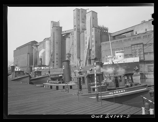 Buffalo, New York. Grain elevators and tugboats on the Erie Canal