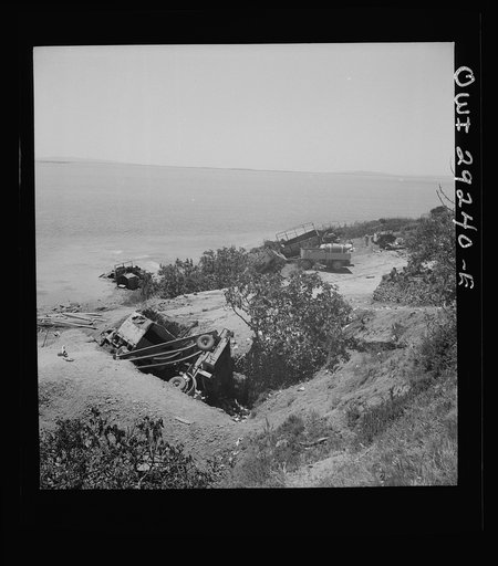 Wreckage of German military equipment at Porto Farina, a fishing village between Bizerta and Tunis, where the German Tenth and Fifteenth Panzer Divisions attempted an evacuation