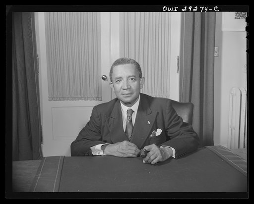 Washington, D.C. Edwin Barclay, President of the Republic of Liberia, is shown at a desk in historic Blair House following a press conference at the United States State Department