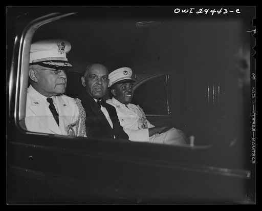 Attended state dinner for the President of Liberia. Cordell Hull, United States Secretary of State, tendered a dinner for His Excellency, Edwin Barclay, President of the Republic of Liberia, Thursday, May 27th at the Hotel Carlton in Washington, D.C. Shown leaving the hotel after the dinner are Gene