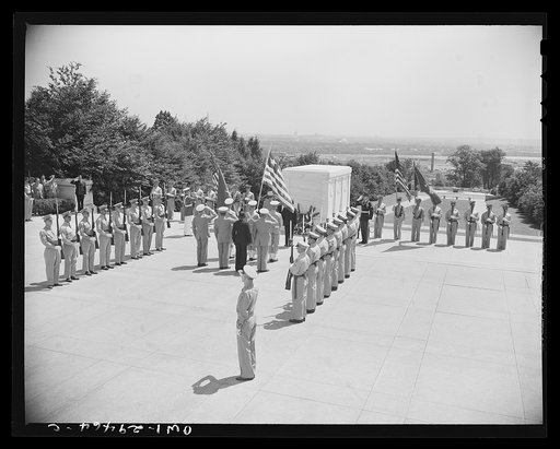 His Excellency, Edwin Barclay, President of the Republic of Liberia, paid homage to the Unknown Soldier on a visit to Arlington National Cemetery Saturday, May 29th. Shown here is the ceremony as President Barclay places a wreath on the Tomb of the Unknown Soldier