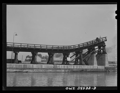 Sandusky, Ohio. The kick-back trestle of the Pennsylvania Railroad number two dock. In the distance, a switch engine that has just delivered a trainload of coal, is going back to the storage yard for more