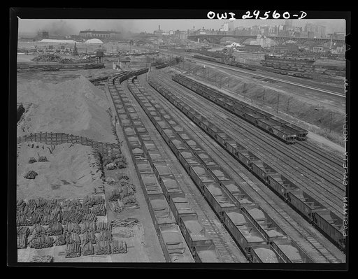 Cleveland, Ohio. On the right, empty cars on their way to the Pennsylvania Railroad iron ore dock; on the left, loaded cars ready to be sent to the steel mills