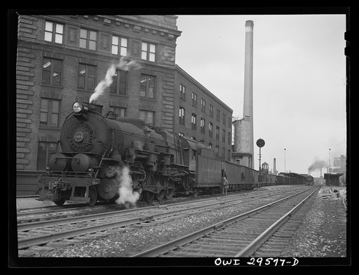 Cleveland, Ohio. A trainload of iron ore at the Pennsylvania Railroad docks waiting to leave for the steel mill area
