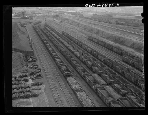 Cleveland, Ohio. On the right, empty cars on their way to the Pennsylvania Railroad iron ore dock; on the left, loaded cars ready to be sent to the steel mills