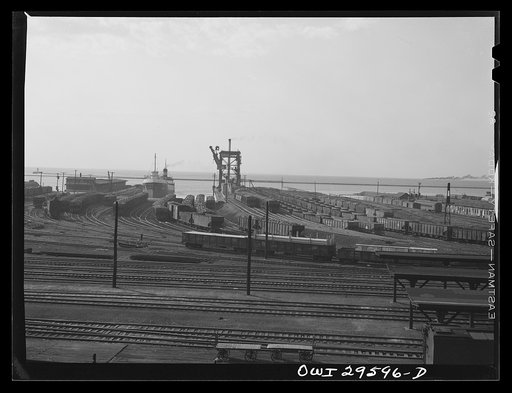 Untitled photo, possibly related to: Cleveland, Ohio. Trainloads of coal at the Pennsylvania Railroad docks waiting to be loaded into freighters for shipment to other lake ports