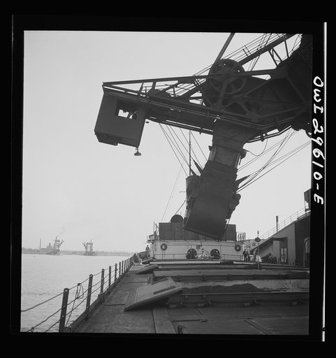 Untitled photo, possibly related to: Sandusky, Ohio. Loading coal into a lake freighter at the Pennsylvania Railroad docks