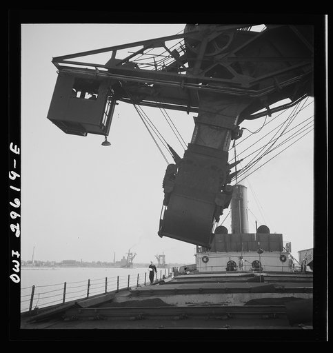 Untitled photo, possibly related to: Sandusky, Ohio. Loading coal into a lake freighter at the Pennsylvania Railroad docks