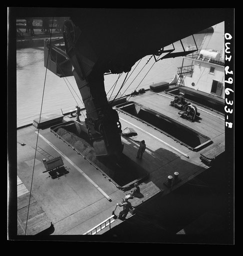 Untitled photo, possibly related to: Sandusky, Ohio. Loading coal into a lake freighter at the Pennsylvania Railroad docks