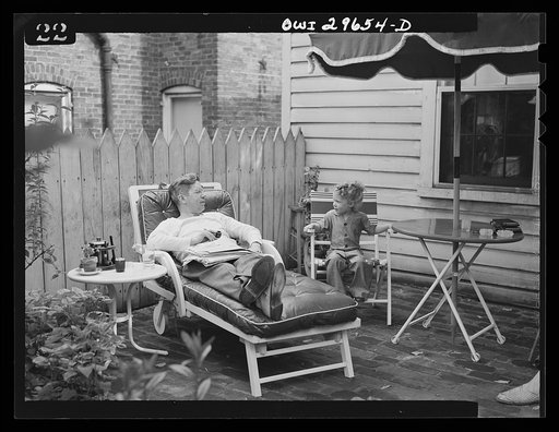 Alexandria, Virginia. Father and son talking on a Sunday afternoon. Scenes similar to this are found all over the United States because of wartime transportation problems