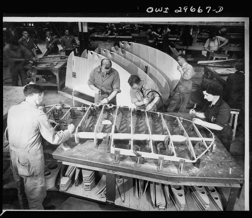 Melbourne, Australia. Beaufort torpedo bomber rear fuselage and tail sub-assembly plant. Assembling rudders