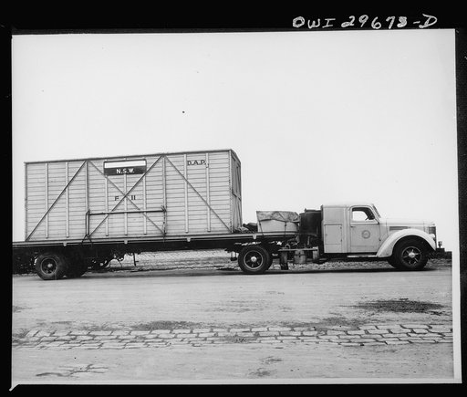 Melbourne, Australia. Beaufort torpedo bomber rear fuselage and tail sub-assembly plant. Specially constructed semi-trailer and crate for local road transport of bomber components from area workshops to main assembly plants