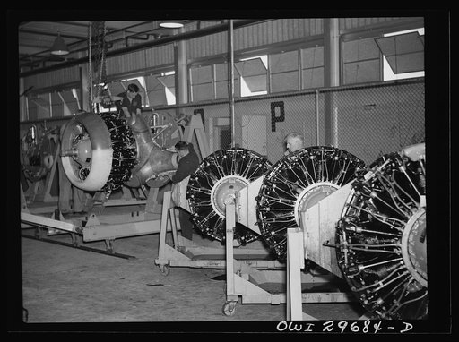 Melbourne, Australia. Beaufort torpedo bomber final assembly plant. Joining American-made Pratt and Whitney motors to a bulkhead to be attached to plane