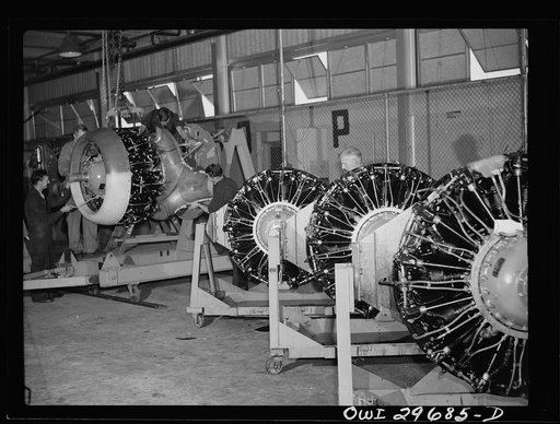 Untitled photo, possibly related to: Melbourne, Australia. Beaufort torpedo bomber final assembly plant. Joining American-made Pratt and Whitney motors to a bulkhead to be attached to plane