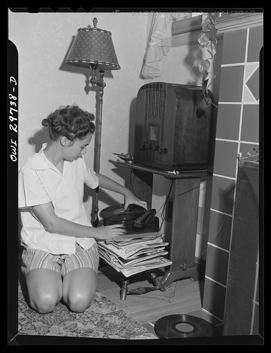 Point Pleasant, West Virginia. Nancy Fergusen playing a record player attached to the radio