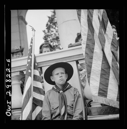 Untitled photo, possibly related to: Arlington Cemetery, Arlington, Virginia. Boy scout color bearer listening to the Memorial Day ceremony