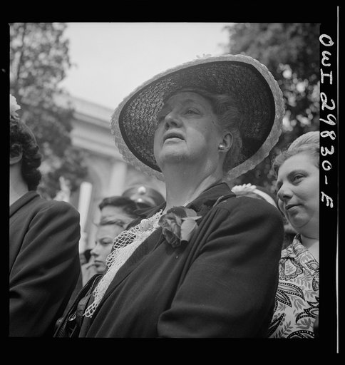 Arlington Cemetery, Arlington, Virginia. A woman watching Colonel Hammond lay the President's wreath on the Tomb of the Unknown Soldier during the Memorial Day services