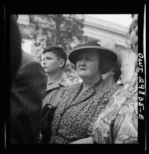 Arlington Cemetery, Arlington, Virginia. A woman watching Colonel Hammond lay the President's wreath on the Tomb of the Unknown Soldier during the Memorial Day services