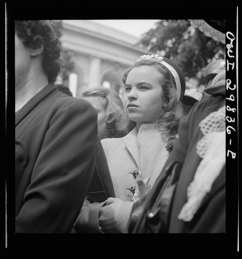 Arlington Cemetery, Arlington, Virginia. A girl watching Colonel Hammond lay the President's wreath on the Tomb of the Unknown Soldier on Memorial Day