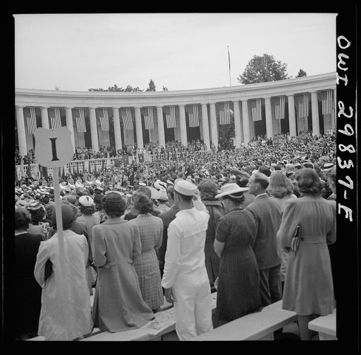 Arlington Cemetery, Arlington, Virginia. A crowd standing to sing the "Star Spangled Banner" on Memorial Day
