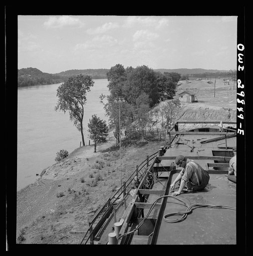 Point Pleasant, West Virginia. Welding on an Army LT boat on the banks of the Ohio River at the Marietta Manufacturing Company