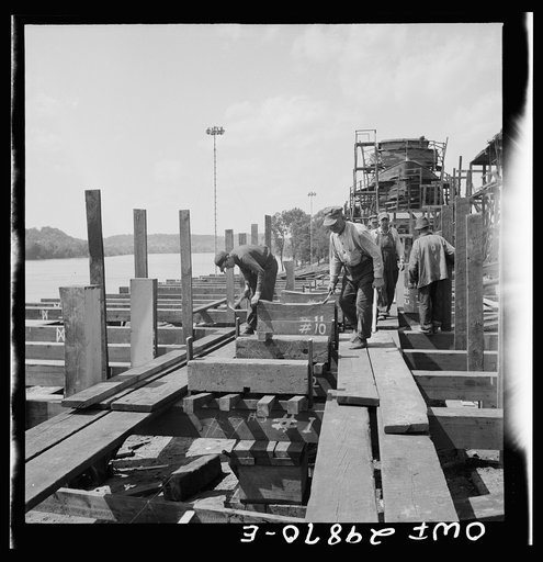 Point Pleasant, West Virginia. Laying the keel block for the United States Army LT boats at the Marietta Manufacturing Company
