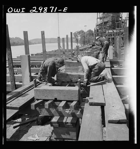 Point Pleasant, West Virginia. Laying the keel block for the United States Army LT boats at the Marietta Manufacturing Company