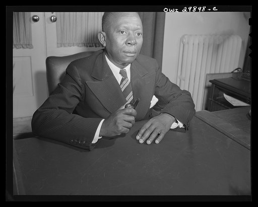 Untitled photo, possibly related to: President-elect of the Republic of Liberia. The Honorable W.V.S. Tubman, President-lect of the Republic of Liberia is shown at a desk in historic Blair House during the official visit of His Excellency, Edwin Barclay, President of the Republic of Liberia on May 3