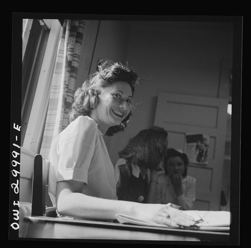 Untitled photo, possibly related to: Washington, D.C. American Red Cross volunteer nurse's aide offering refreshments to a blood donor at the center
