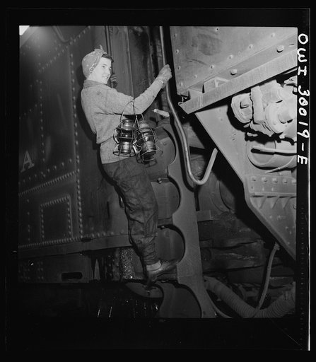 Untitled photo, possibly related to: Pitcairn, Pennsylvania. Mrs. Mary Ankrom, twenty-eight, mother of six children, employed at the Pennsylvania Railroad engine house as a locomotive preparer, earning fifty-eight cents per hour. Her father takes care of her children while she is working