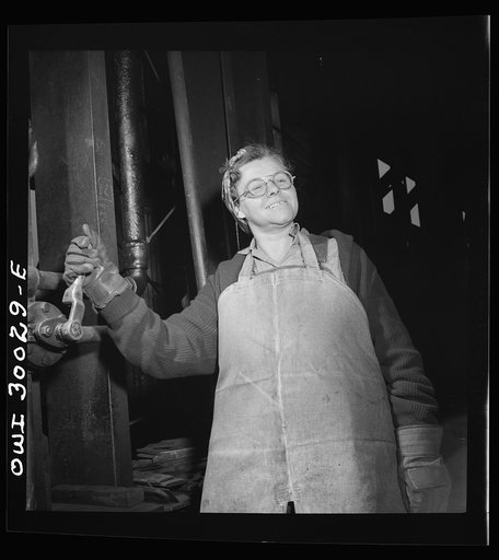 Pitcairn, Pennsylvania. Mrs. Hazel Stokum, thirty-seven, mother of six girls, employed at the Pennsylvania Railroad steel car shops as a car repairman's helper, earning seventy-two cents per hour. Mrs. Stokum lives in Jeanette, Pennsylvania, and travels to and from work by train. Her husband works i