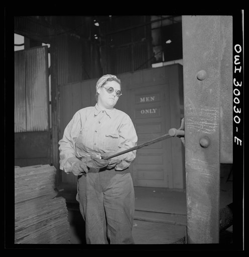 Untitled photo, possibly related to: Pitcairn, Pennsylvania. Mrs. Agnes Glunt, mother of a child four years old, employed as a rivet heater in the Pitcairn, Pennsylvania Railroad steel car shop, earning seventy-two cents per hour. Her husband works at the Westinghouse Electric Company
