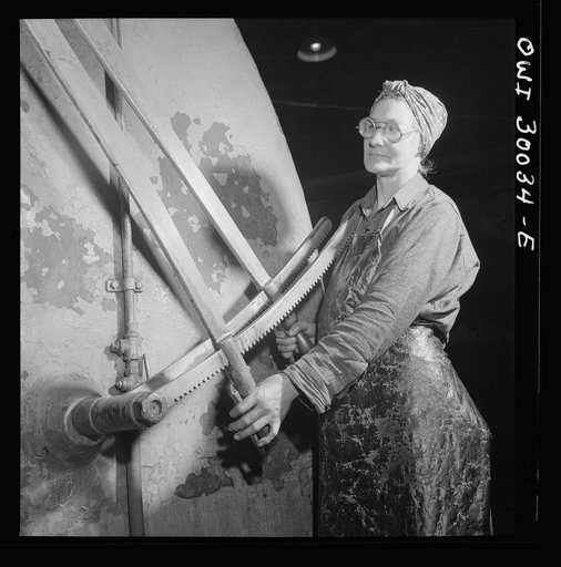 Pitcairn, Pennsylvania. Mrs. Katie Sablejack, forty-five, a Hungarian, employed as a blacksmith's helper in the Pennsylvania Railroad yards, earning seventy-two cents per hour. She is operating a half-ton steam hammer. Mrs. Sablejack is a widow and mother of two children
