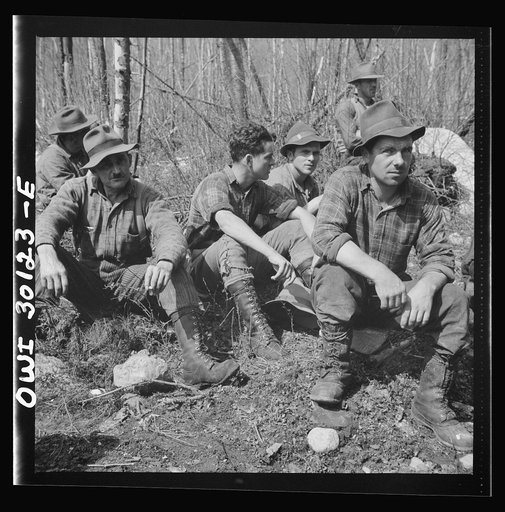 Untitled photo, possibly related to: Spring pulpwood drive on the Brown company timber holdings in Maine. Mid-morning or mid-afternoon lunch by the side of the road near where woodsmen are working